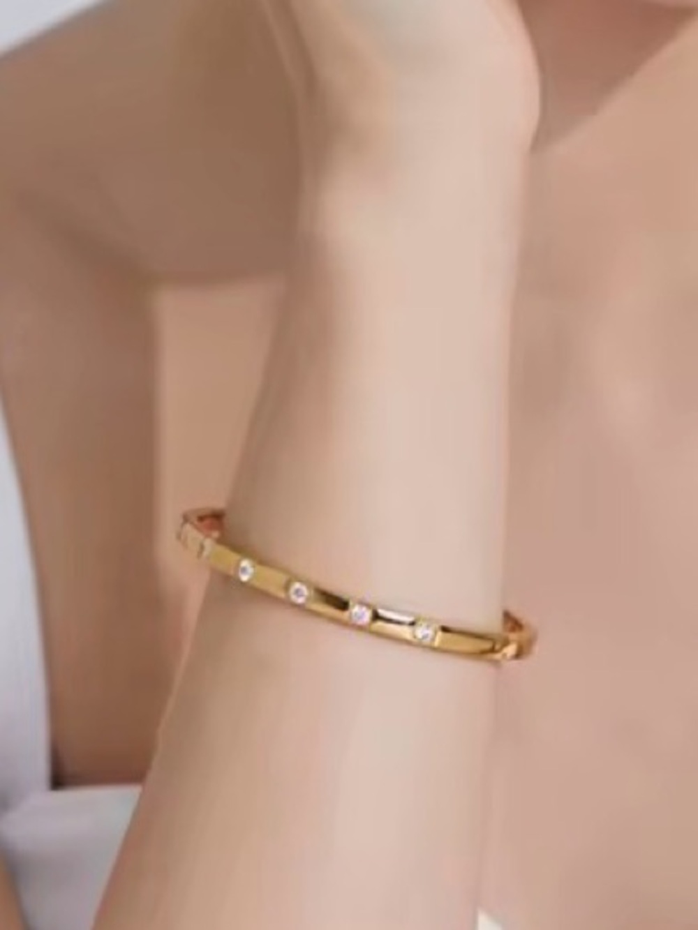 Gold PVD Plated Stainless Steel Bangle with Cubic Zirconia Accents - Picture 3 of 9